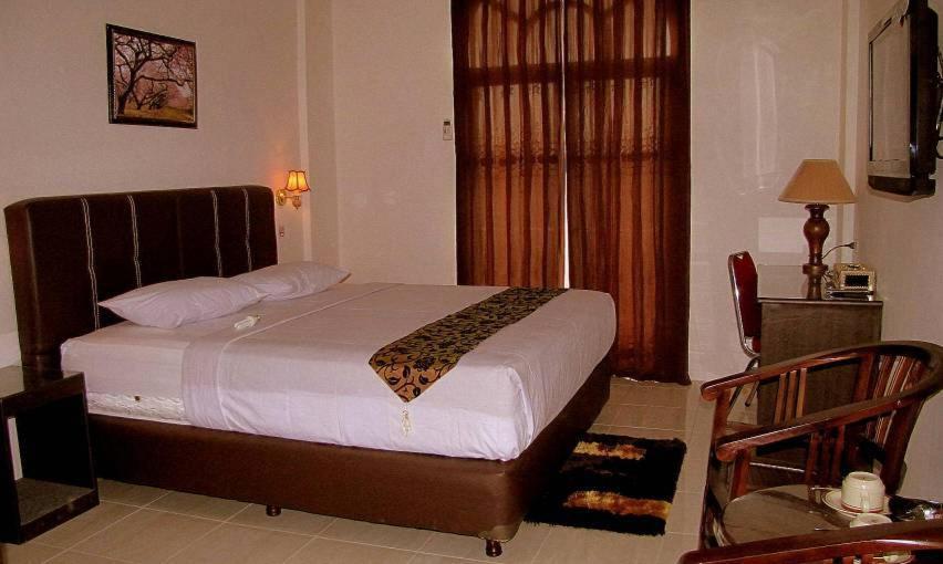 Hotel Mitra Garden Панкалпинанг Номер фото